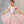 Roze tutu van een jonge ballerina